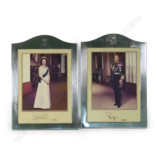 A pair silver framed and signed photos of Queen Elizabeth II and Prince Phillip,