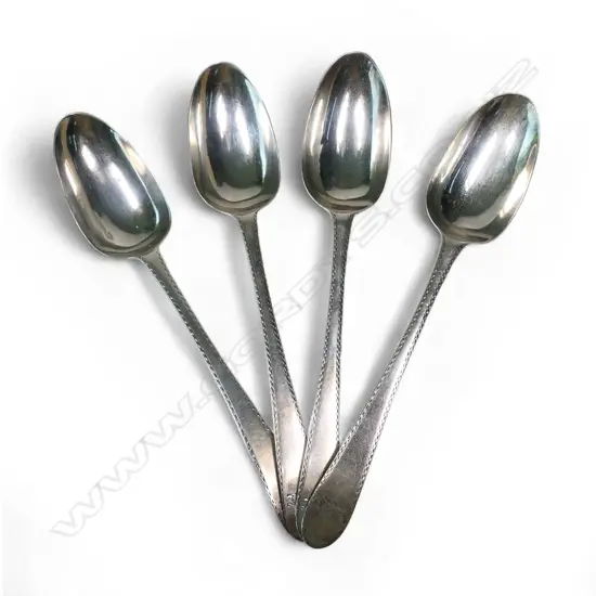 Set of four George III Irish silver table spoons,