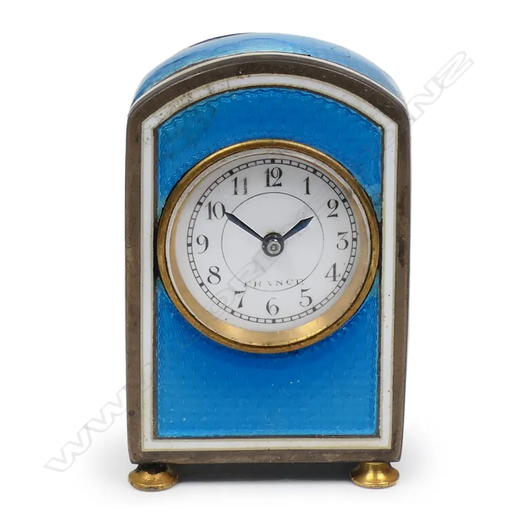 An early 20thC French silver and enamel miniature travelling clock, Image 1++
