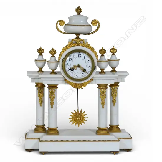 A 19thC French marble and ormolu mantel clock,
