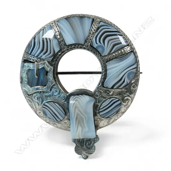 A late Victorian Scottish silver and Montrose agate brooch,
