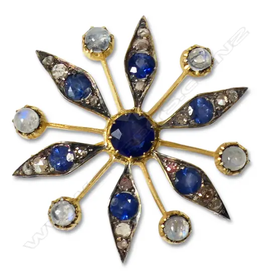 A silver gilt antique style diamond and gemstone brooch,