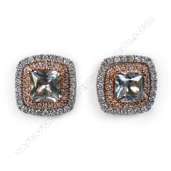 A pair of 14ct white and rose gold aquamarine and diamond stud earrings,