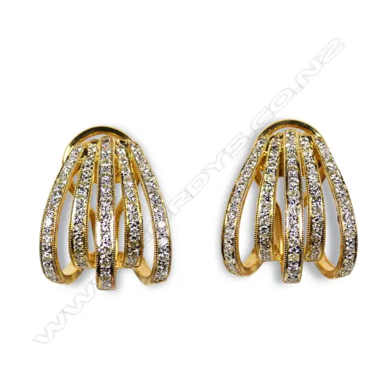 A pair of 18ct gold and diamond earrings,