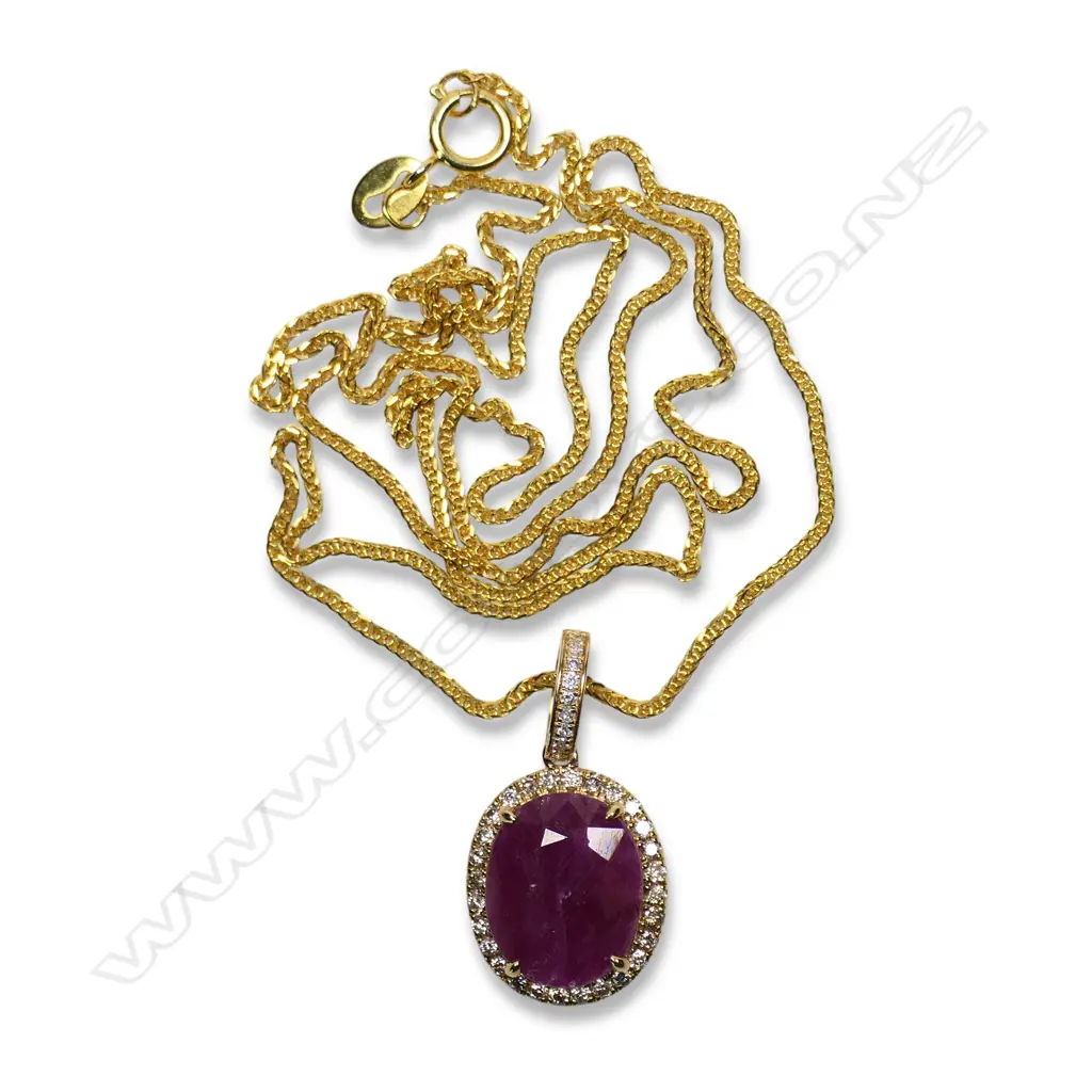 A 9ct gold ruby and diamond pendant, Image 1++