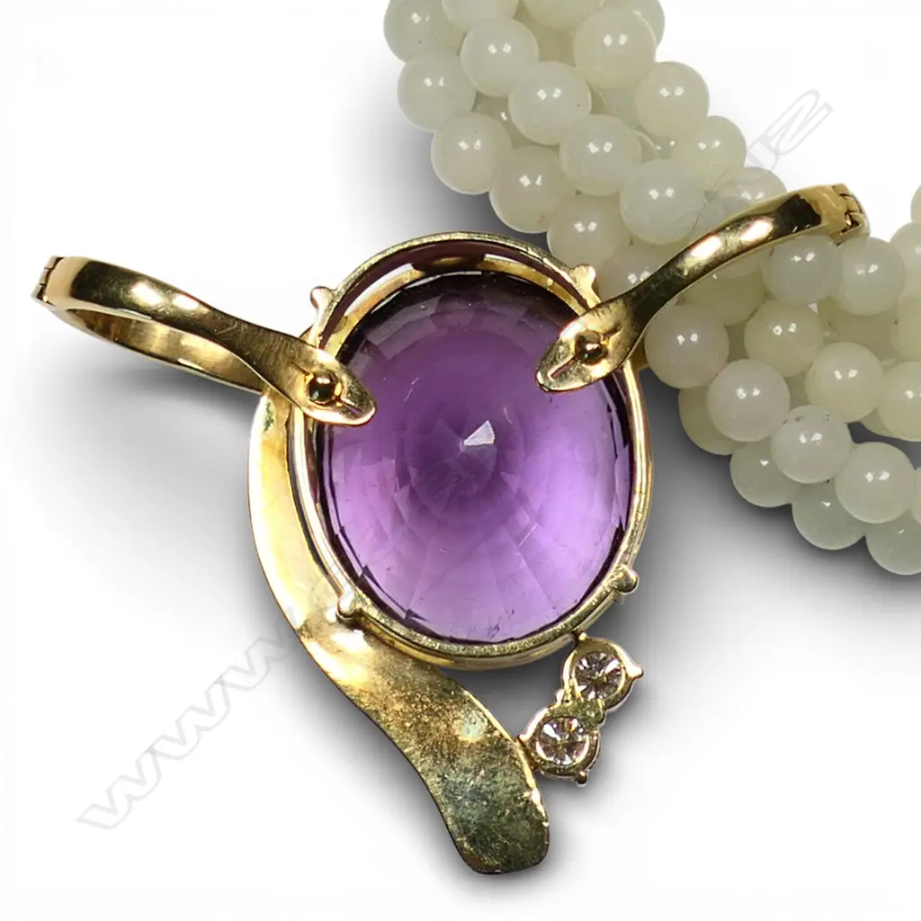 A jadeite bead necklace with 18ct gold amethyst and diamond enhancer, Image 1++