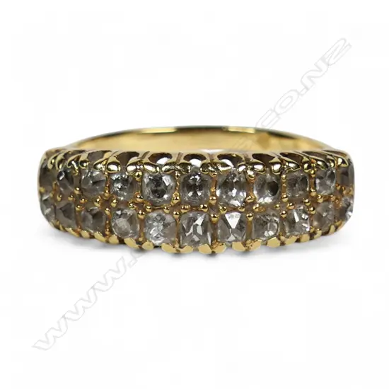 An estate 18ct gold double row diamond ring,