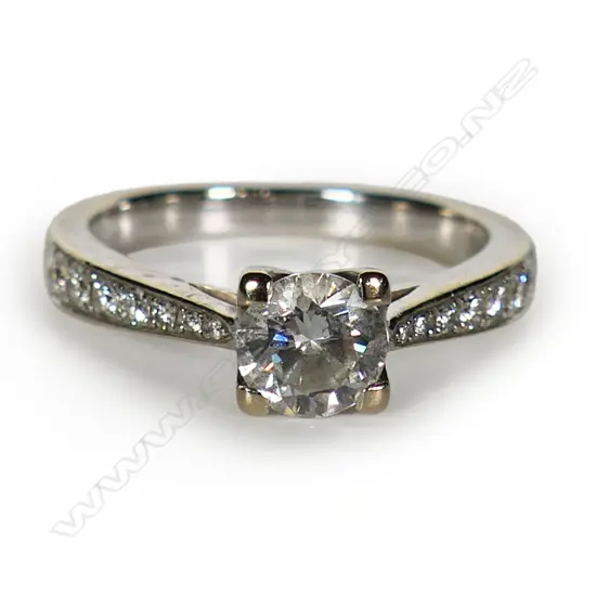 An 18ct white gold and diamond solitaire ring,