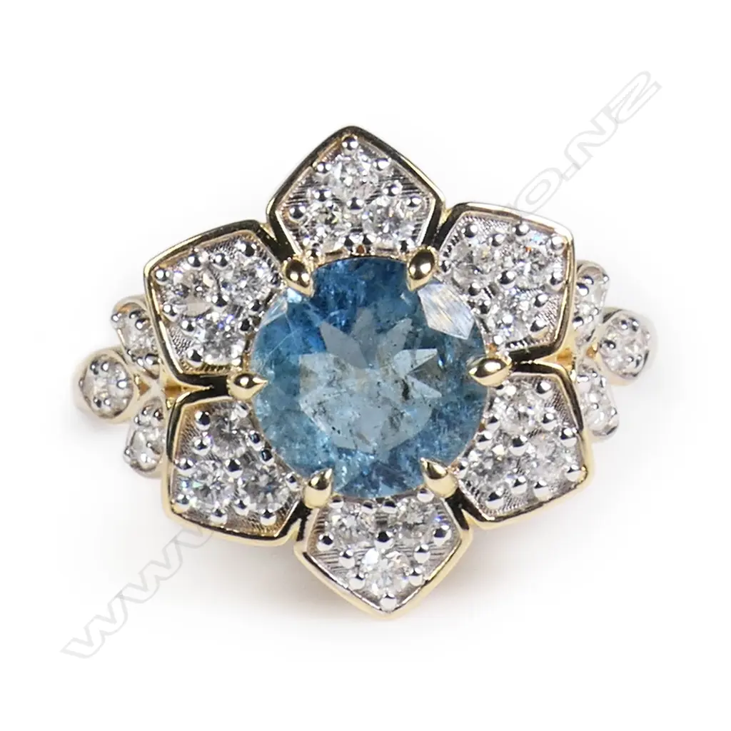 A 14ct gold aquamarine and diamond dress ring, Image 1++