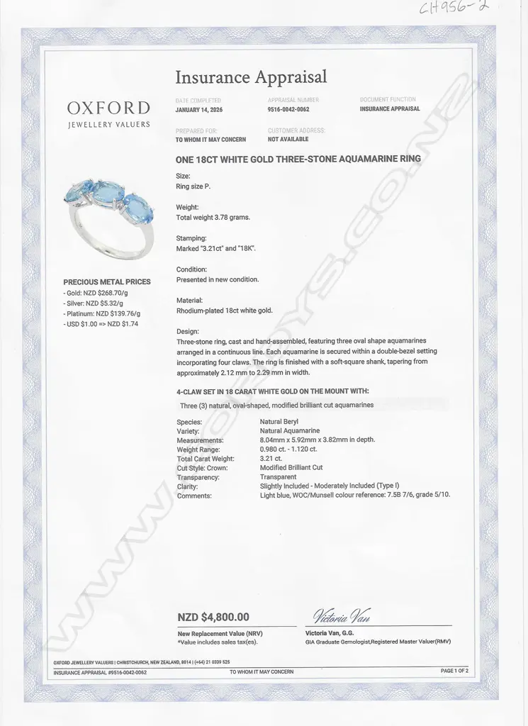 An 18ct white gold and three stone aquamarine ring, Image 1++