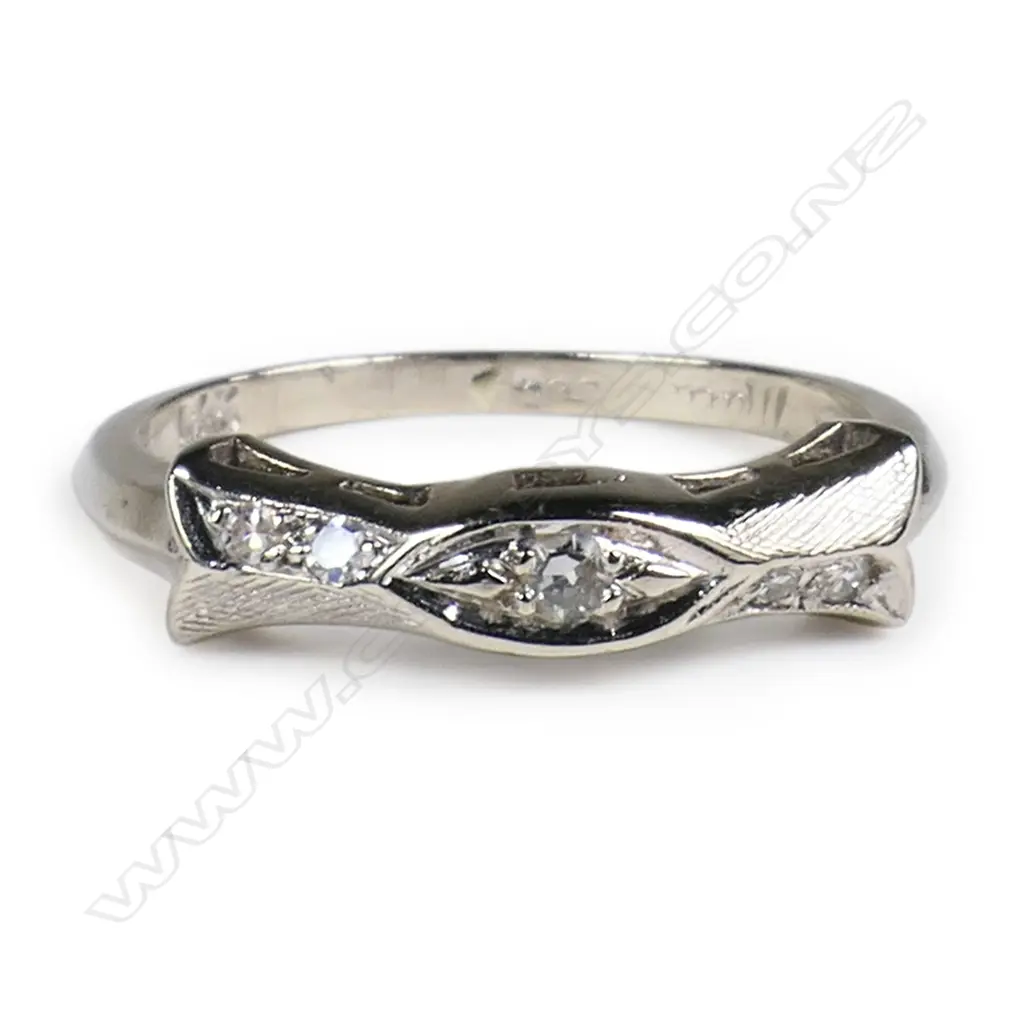 A 14ct white gold and diamond band ring, Image 1++