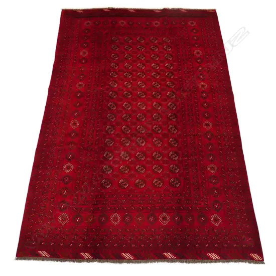 An antique hand-knotted Turkoman carpet,