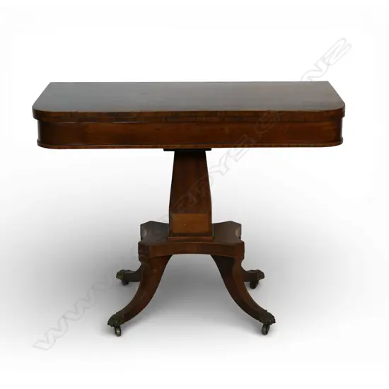A Regency mahogany games table,