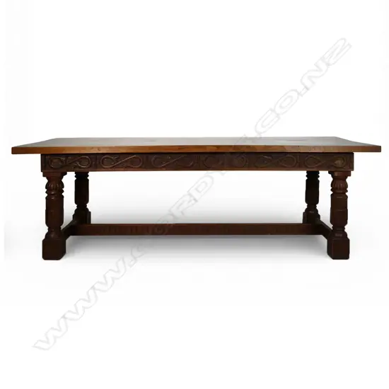 A large solid antique oak Elizabethan style refectory dining table,