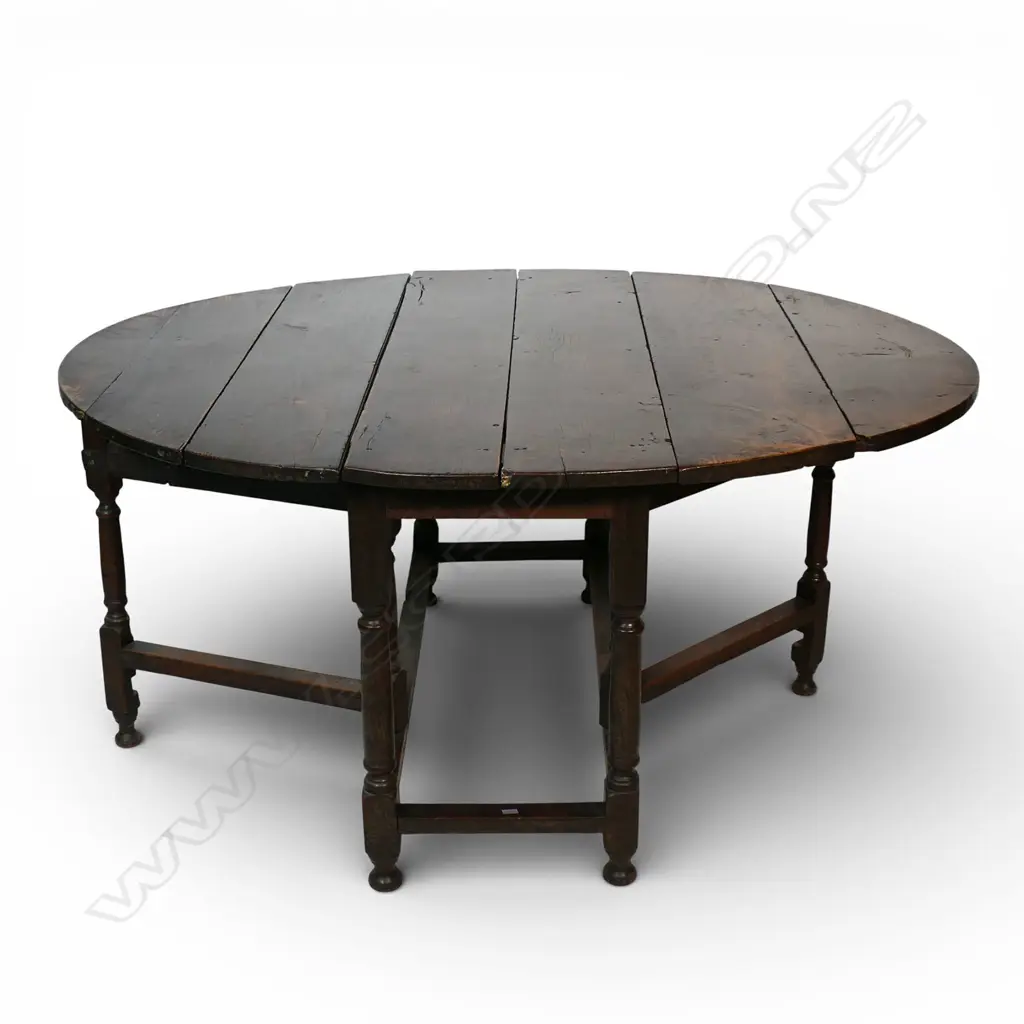 A substantial Georgian oak large country gate leg table, Image 1++