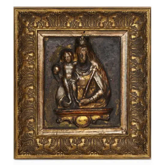 An Italian 18thC cartapesta gilded relief of the Virgin and Child,