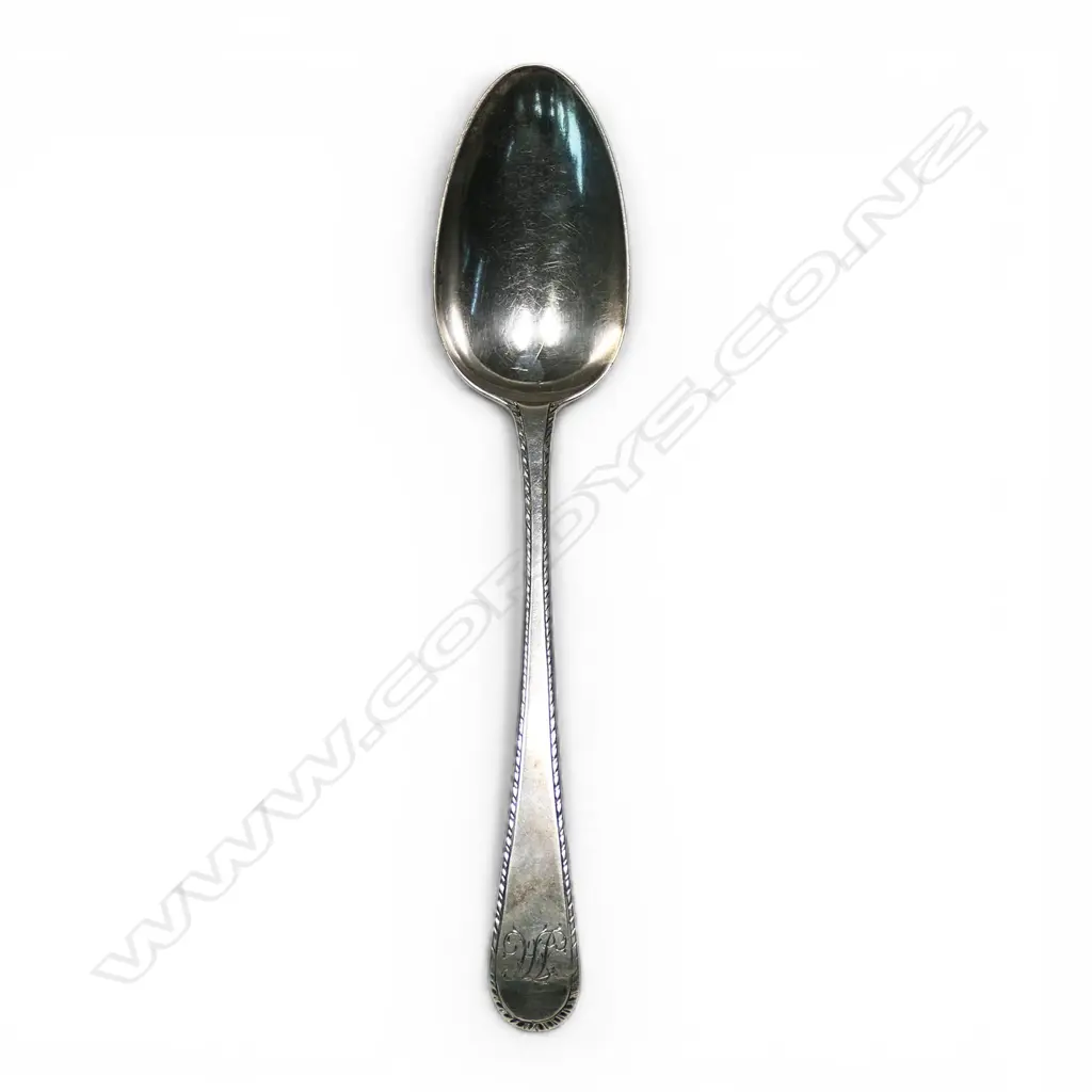 A George III silver feather edged table spoon, Image 1++