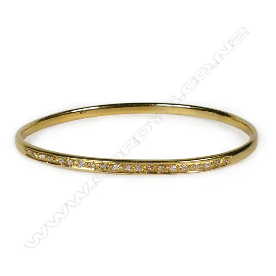 A Simon Misdale original 18ct gold and diamond bangle,