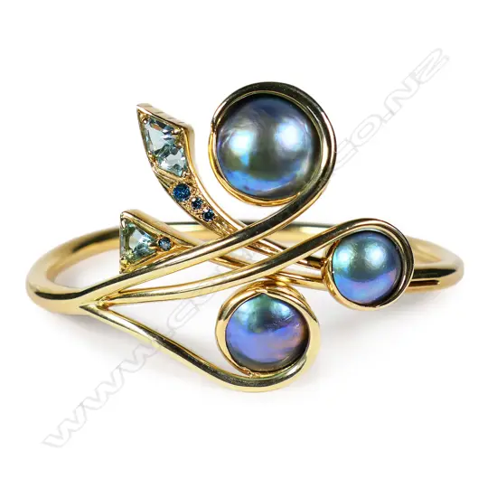 A Simon Misdale original 9ct gold topaz and paua mabe pearl bangle,