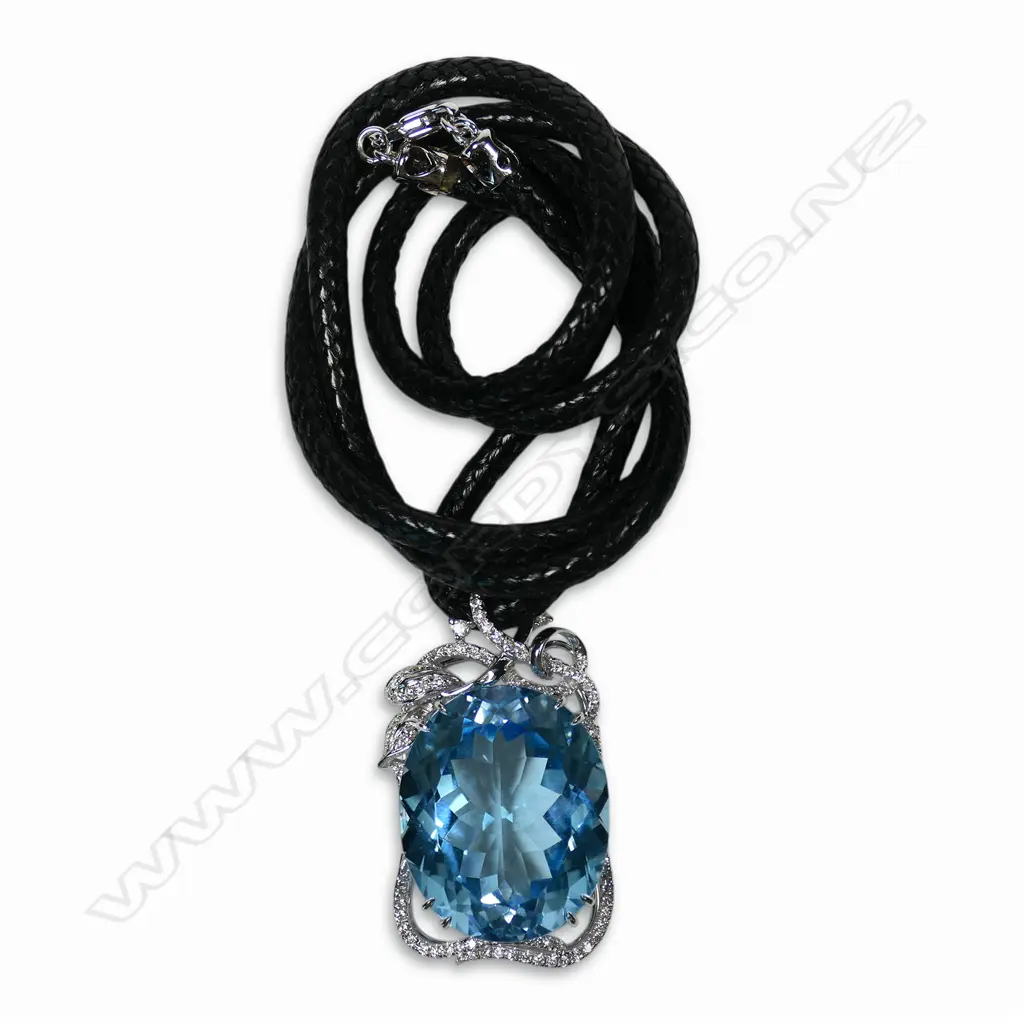 An 18ct white gold diamond and large blue topaz pendant, Image 1++