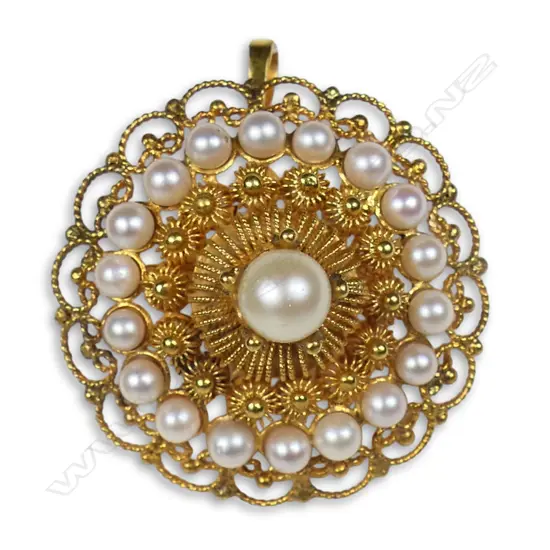 A 15ct yellow gold and seed pearl domed cluster brooch,