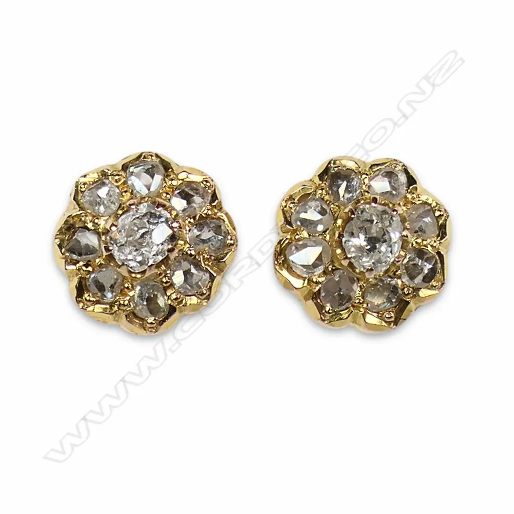 A pair of 14ct gold and diamond cluster stud earrings, Image 1++