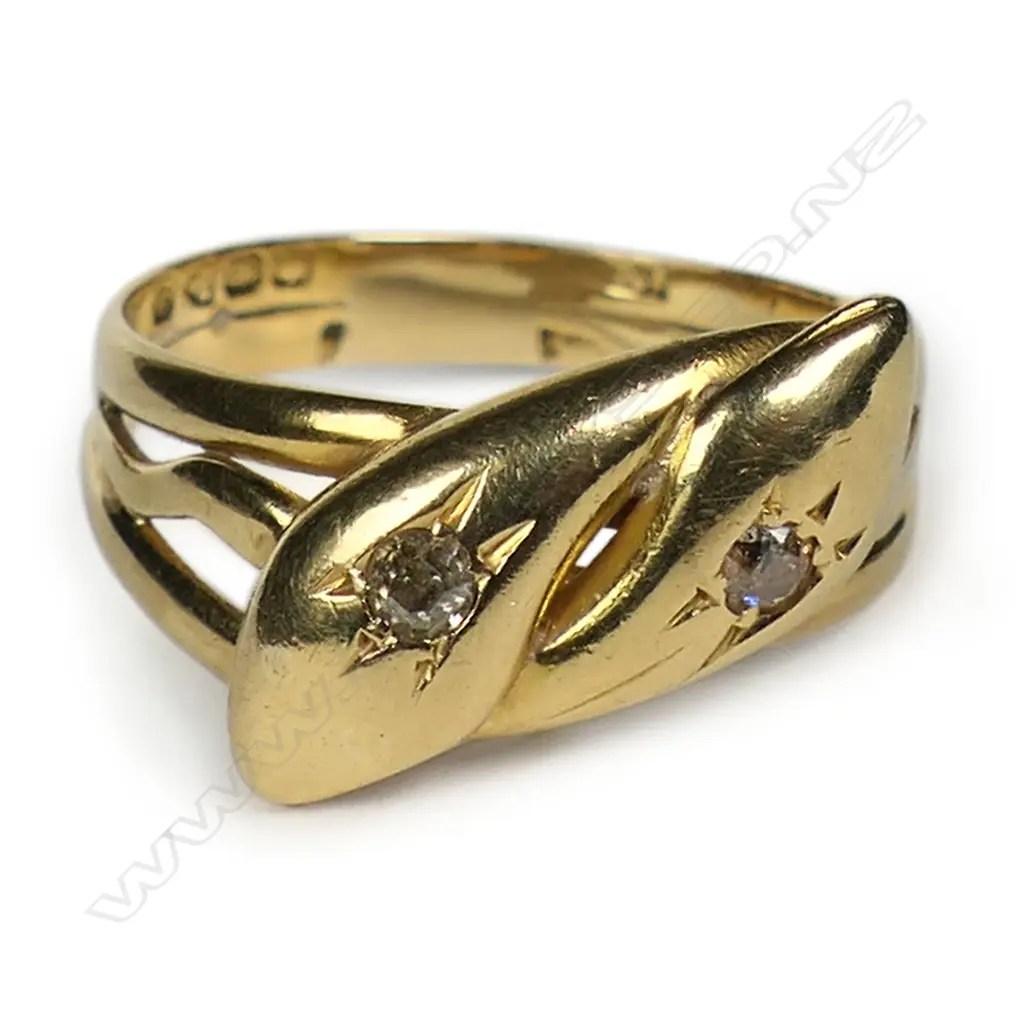 An early 20thC 18ct yellow gold and diamond snake ring, Image 1++