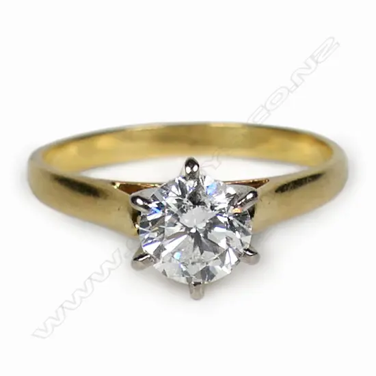 An 18ct gold and diamond solitaire ring,