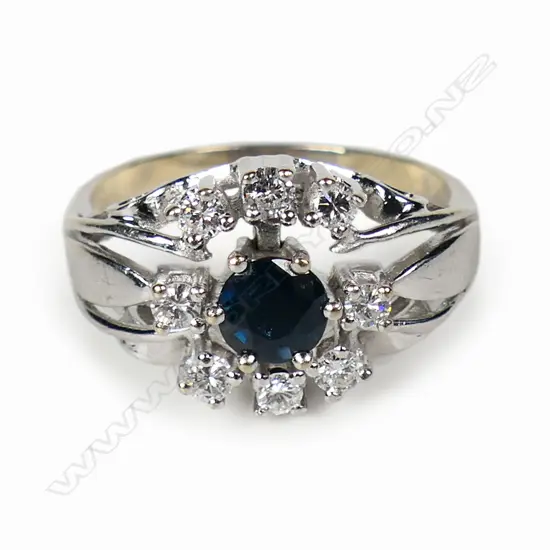 A 14ct white gold sapphire and diamond dress ring,