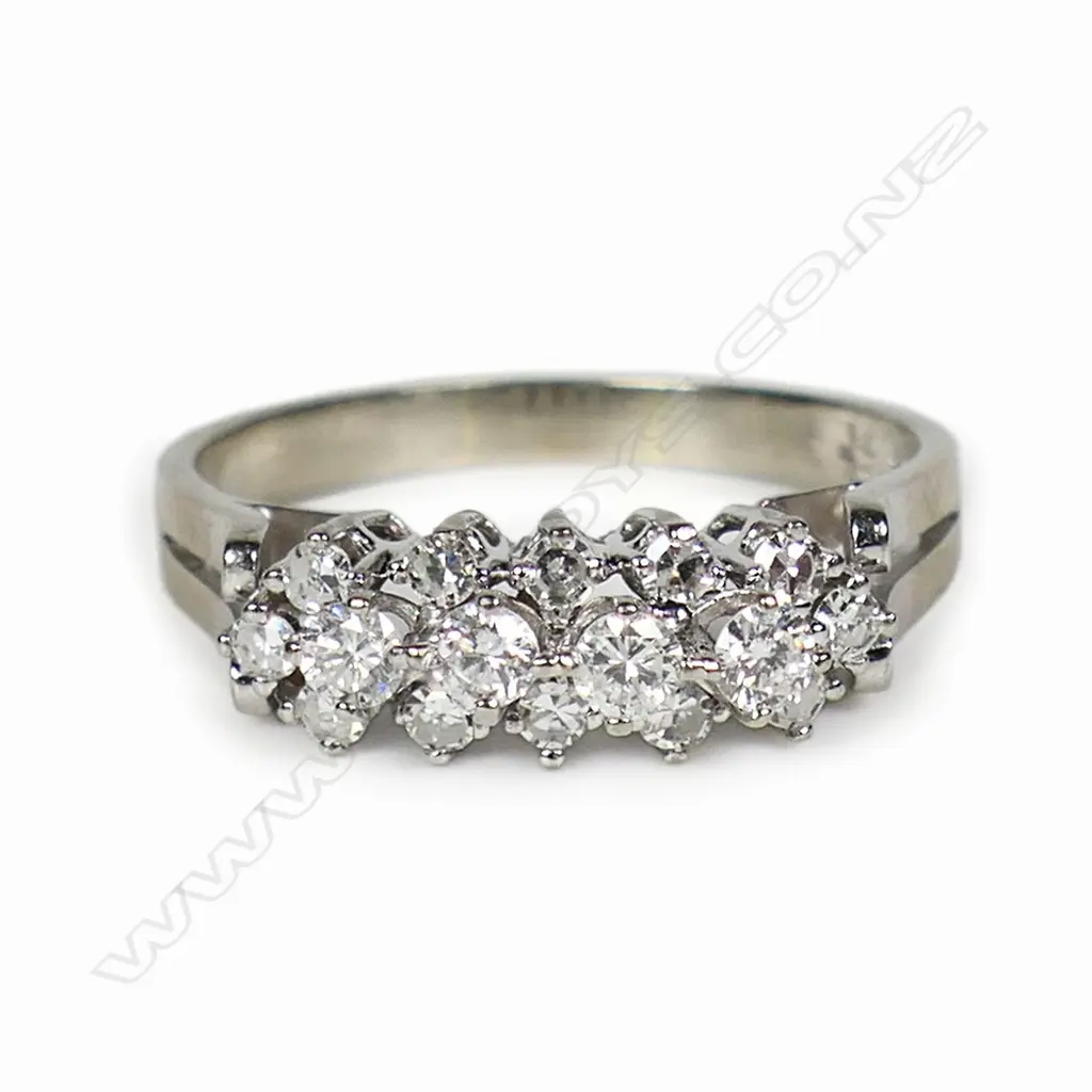 A 14ct white gold and diamond dress ring, Image 1++