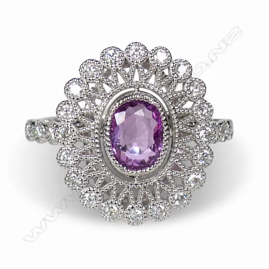A 14ct white gold pink sapphire and diamond cluster ring,