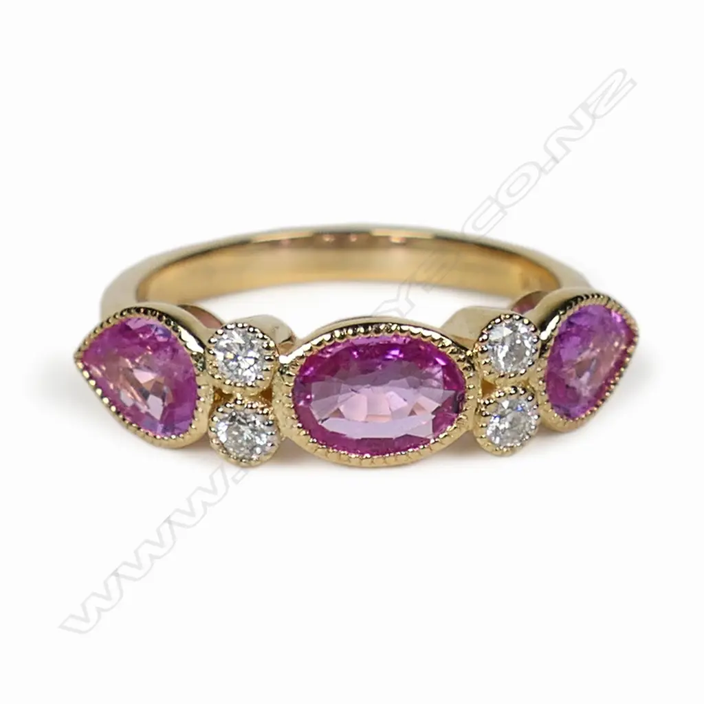 A 14ct gold pink sapphire and diamond dress ring, Image 1++