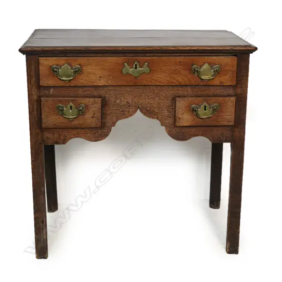 A George III oak lowboy,
