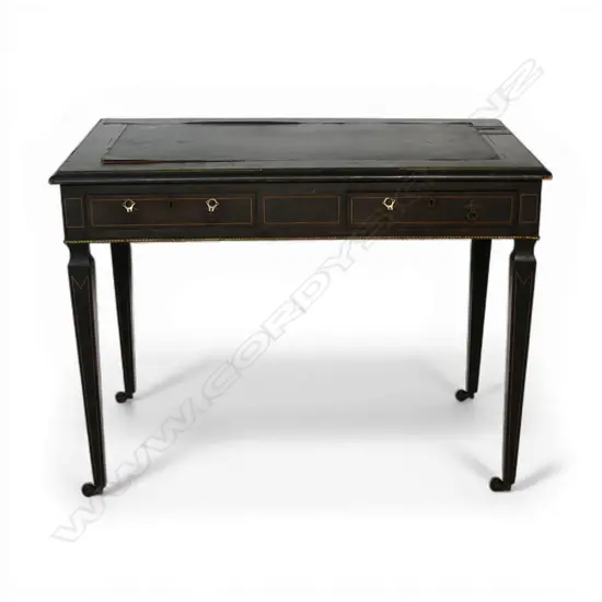 A Victorian ebonised writing table,