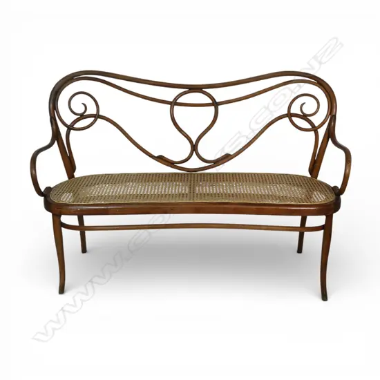 An early 20thC bentwood settee,