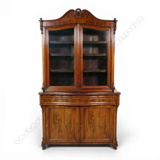 A 19thC walnut tall glazed bookcase cabinet,