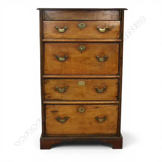 An uncommon 19thC European oak four drawer chest,