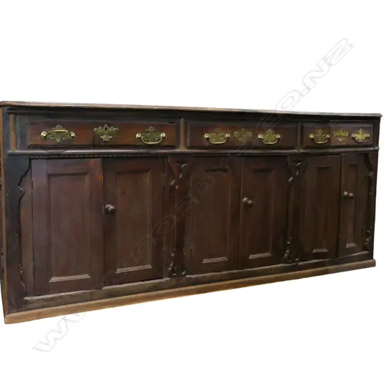 A George III oak long dresser base,