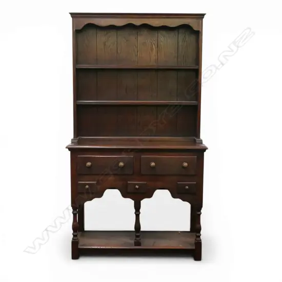 An early to mid 20thC small proportion kitchen dresser,