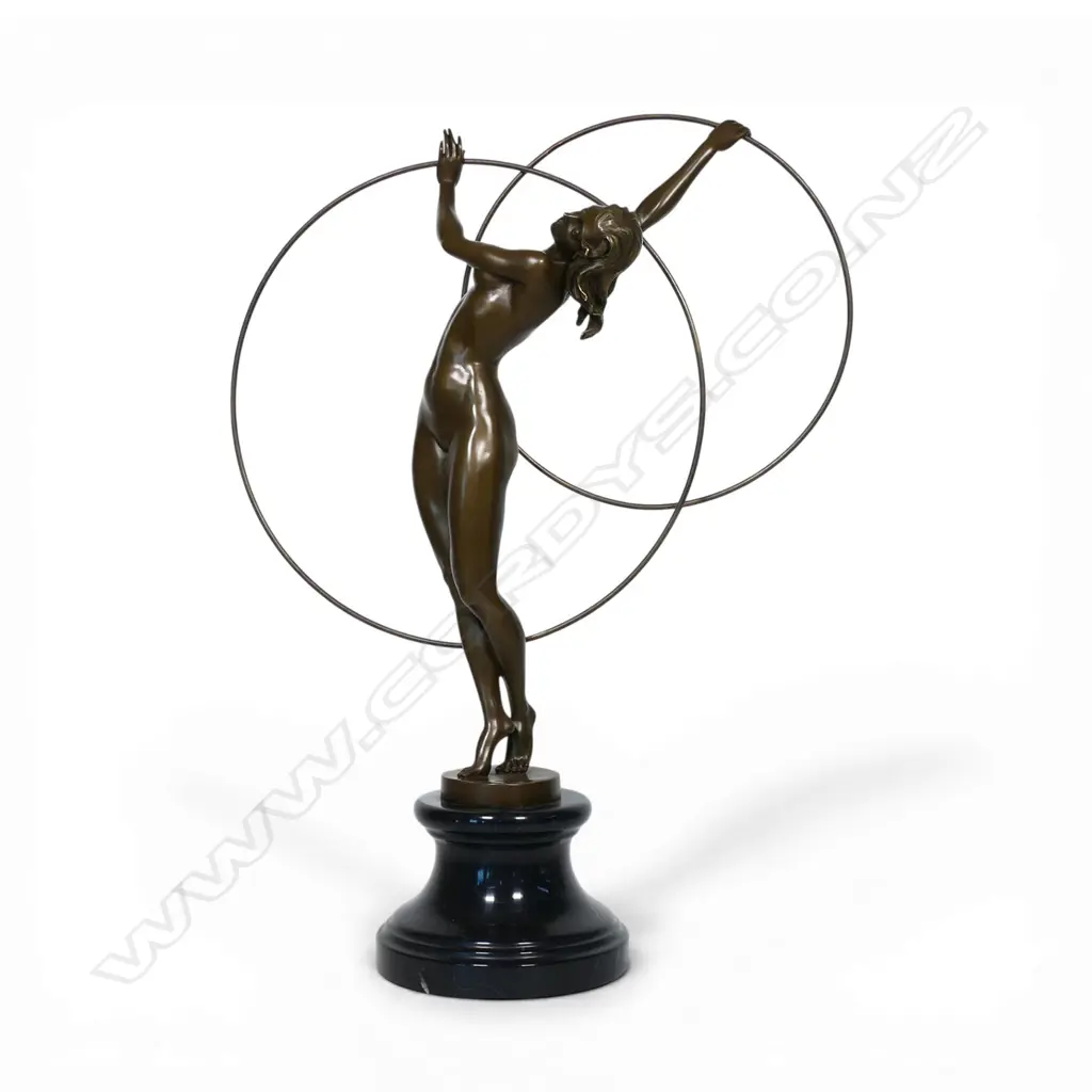 An Art Deco-style bronze 'Danseuse aux cerceaux' sculpture, Image 1++