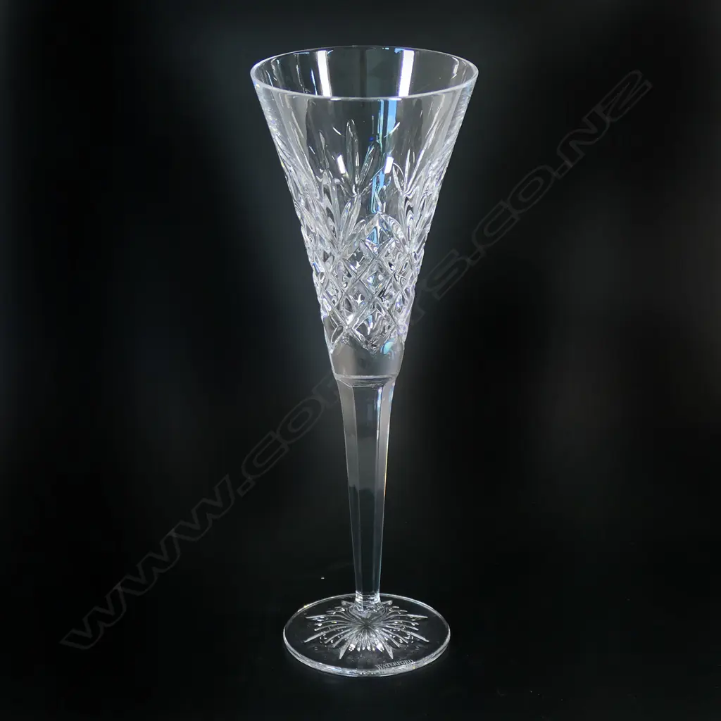 A set of six Waterford crystal toasting champagne flutes, Image 1++