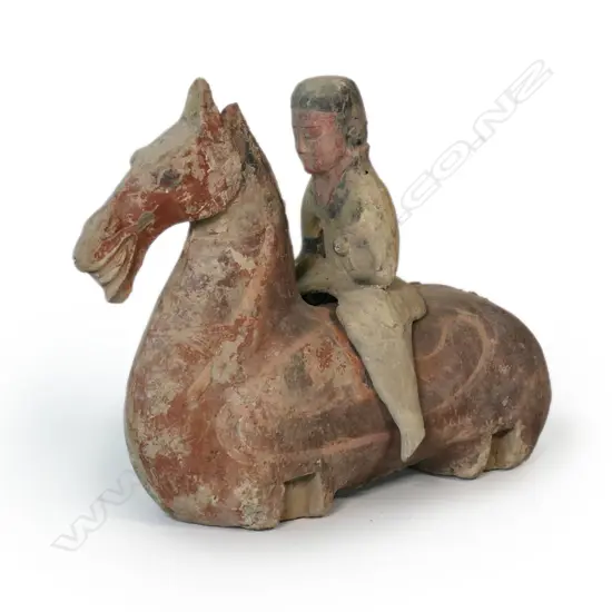 A reputed Han Dynasty pottery horse torso and rider,