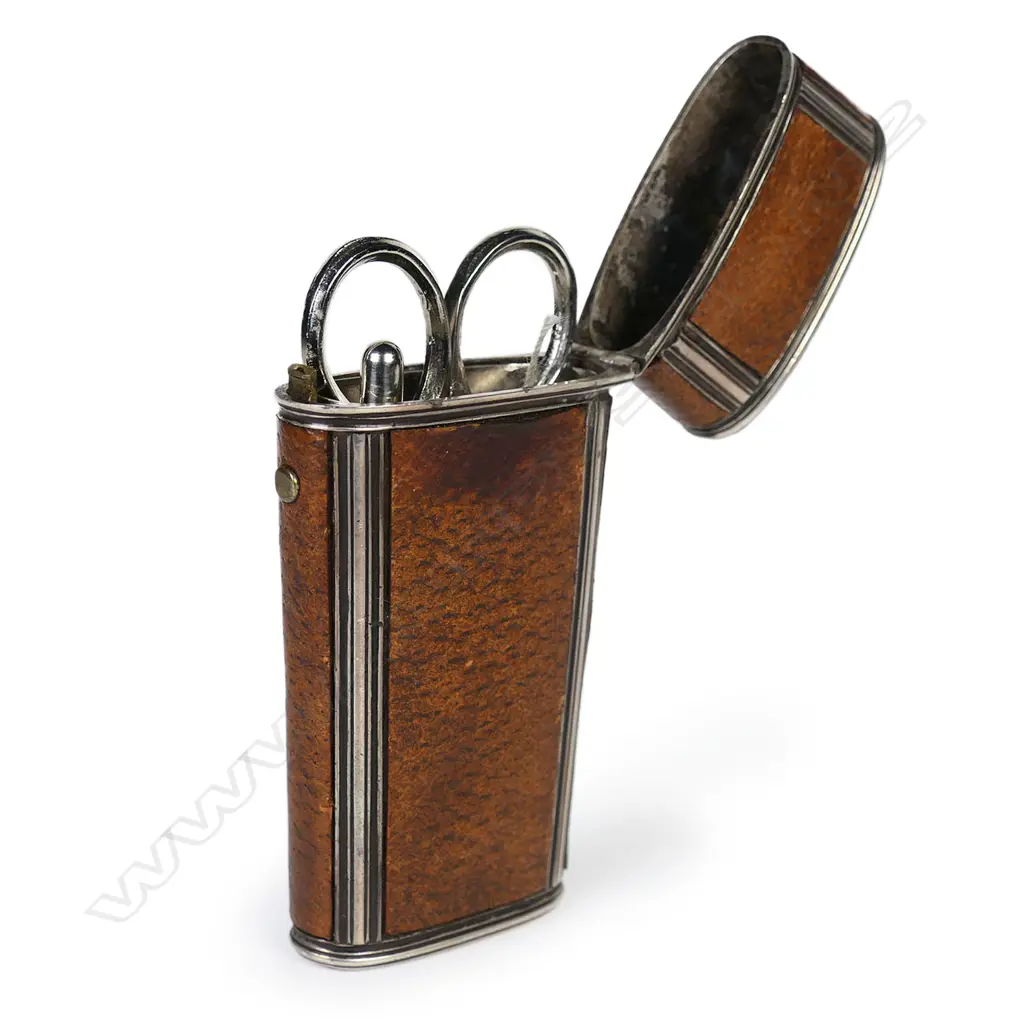 An unmarked silver and leather covered etui, Image 1++