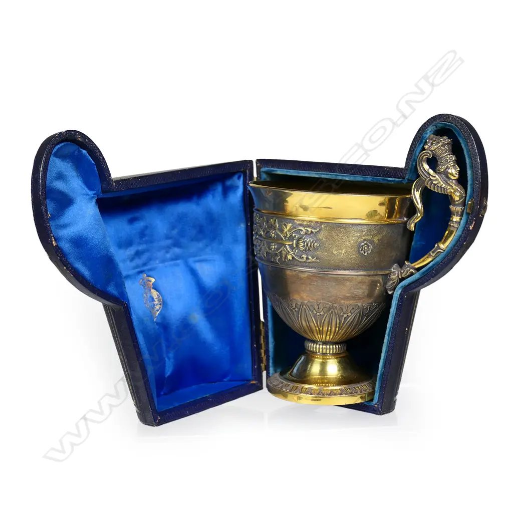 A French Charles X silver gilt vermeil cup in case, Image 1++
