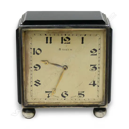 An Art Deco Swiss 925 silver and onyx small desk clock,