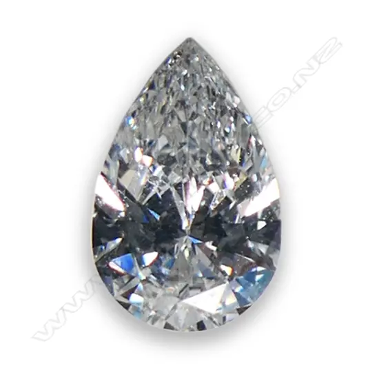 A loose brilliant pear cut diamond,