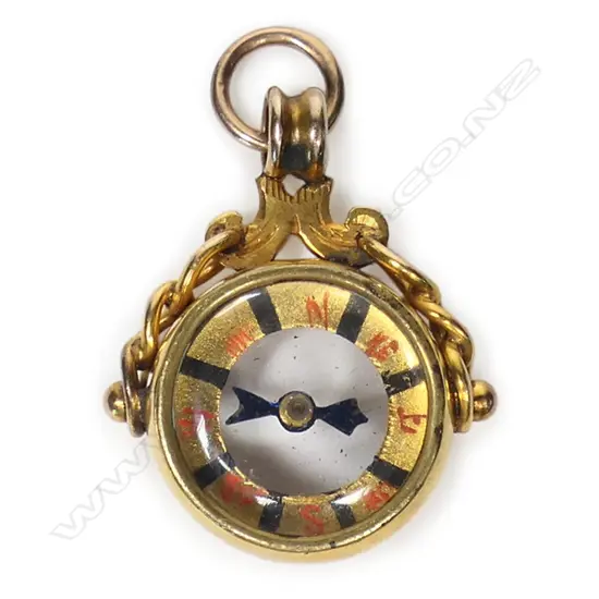 A c.1900 9ct gold compass fob,