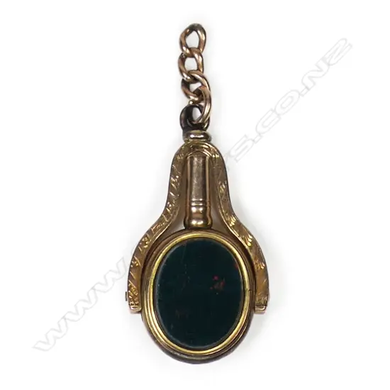 A late Victorian 9ct gold watch key spinner fob,