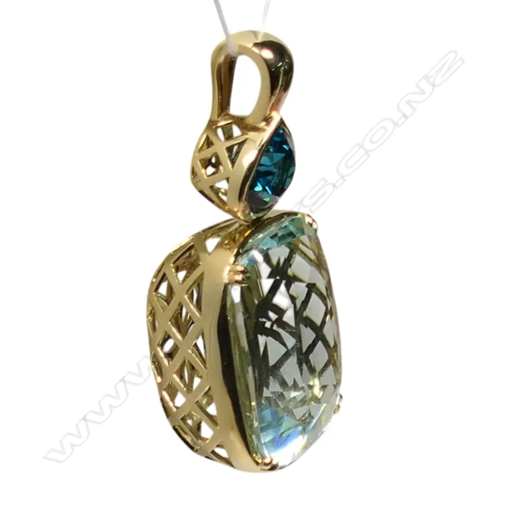 A large 18ct gold aquamarine and Cambodian zircon pendant , Image 1++