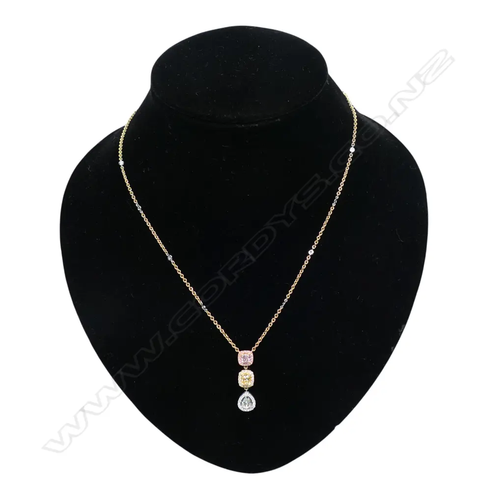 An 18ct white rose and yellow gold diamond drop necklace, Image 1++